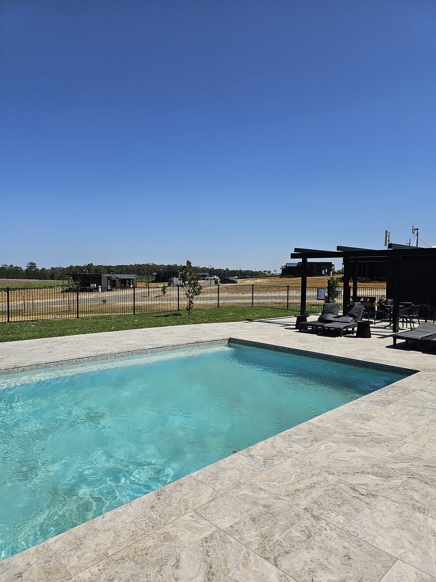 Pool and cabins at Bimbadgen — The Lane Retreat, Hunter Valley